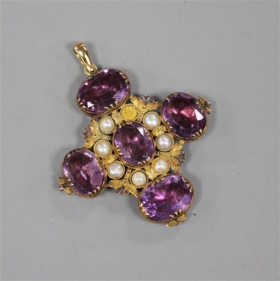 A 19th century textured yellow metal, amethyst and split pearl set cross pendant, 39mm, gross 9 grams.